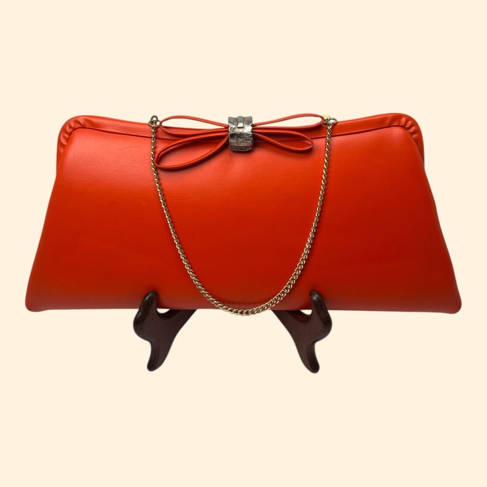 1960s Vintage Orange Clutch Purse with Bow Clasp and Chain Handle